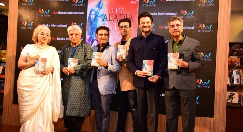 Journalist and author Khalid Mohamed with filmmaker Karan Johar, poet, lyricist and screenwriter Javed Akhtar and actor Anil Kapoor at the launch of his book "The Aladia Sisters" in Mumbai on Oct 7, 2019. (Photo: IANS)