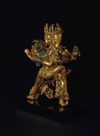 A LARGE AND RARE GILT-BRONZE FIGURE OF CHAKRASAMVARA AND VAJRAYOGINI  12¼ IN. (31.3 CM.) HIGH CENTRAL TIBET, DENSATIL MONASTERY,  SECOND HALF 14TH-FIRST HALF 15TH CENTURY ESTIMATE: $1,000,000-1,500,000