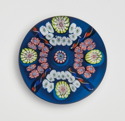 A French glass patterned colour ground paperweight