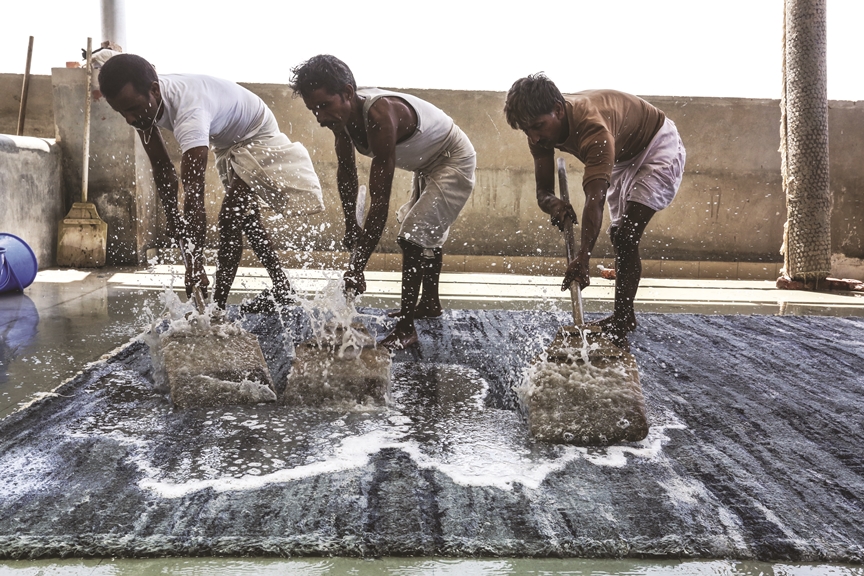 Weaving rugs and lives