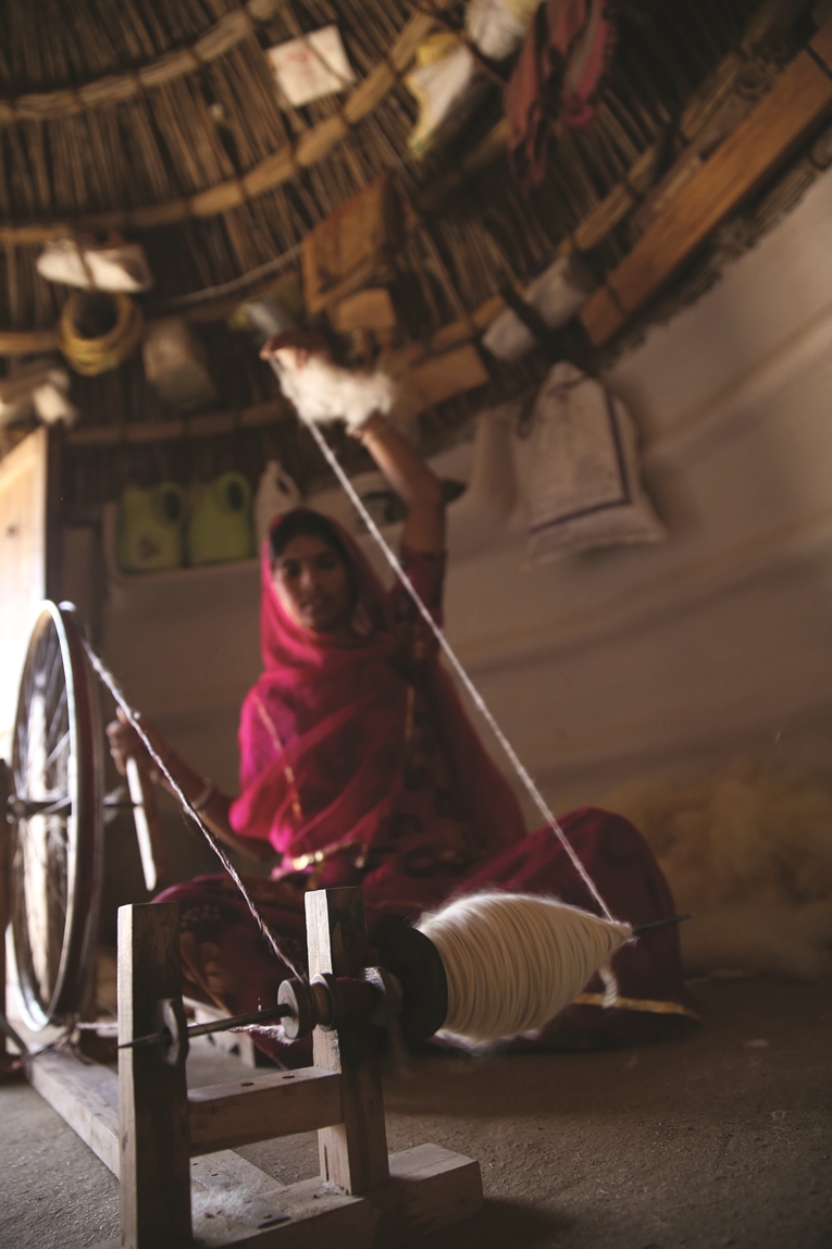 Weaving rugs and lives