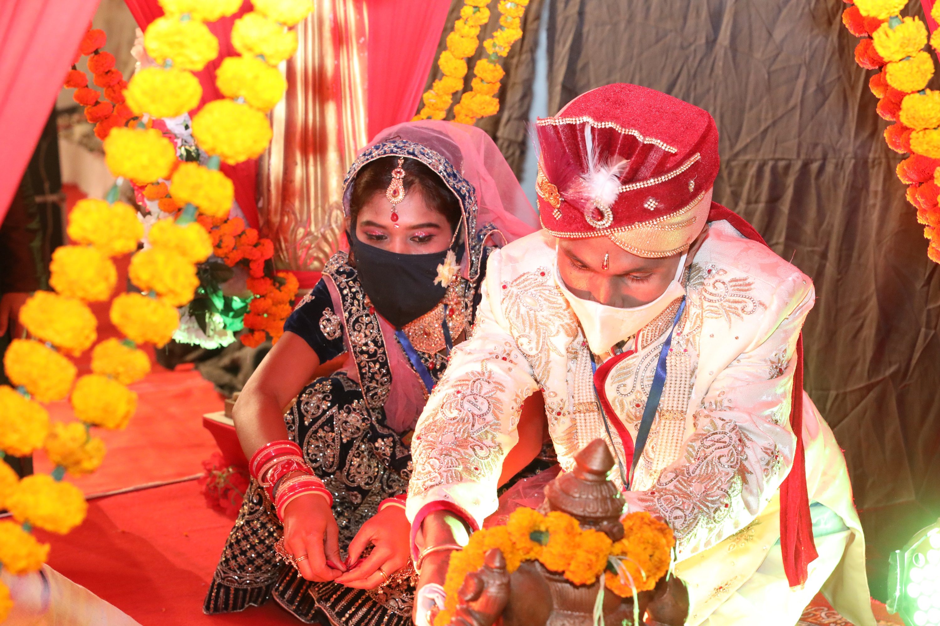 11 differently abled and underprivileged couples tie knots, vowing to wear masks at the 35th mass wedding ceremony