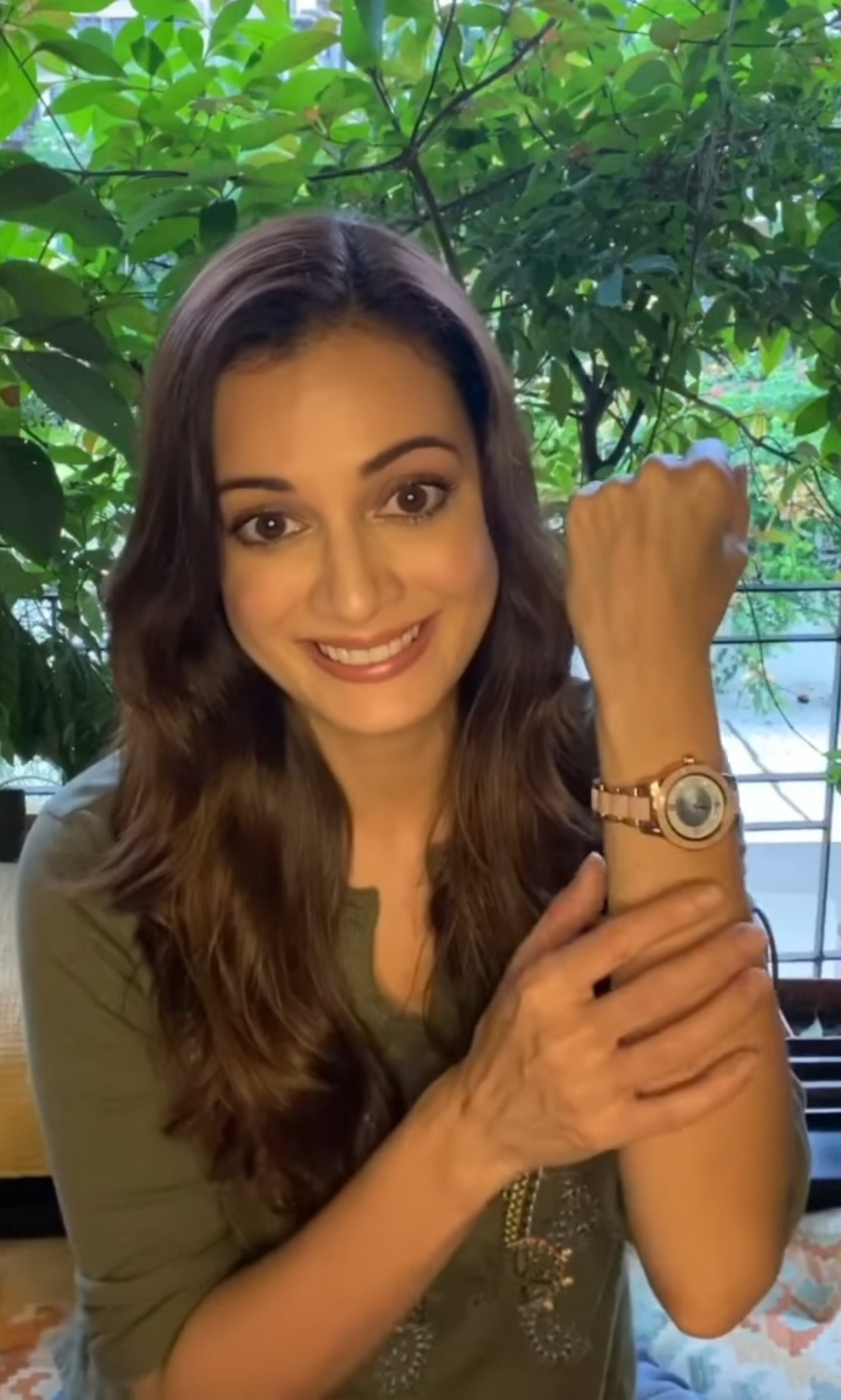 Actress Dia Mirza wearing Anne Klein Considered watch