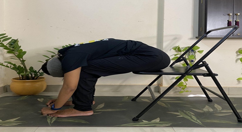 Chair Paschimottanasana