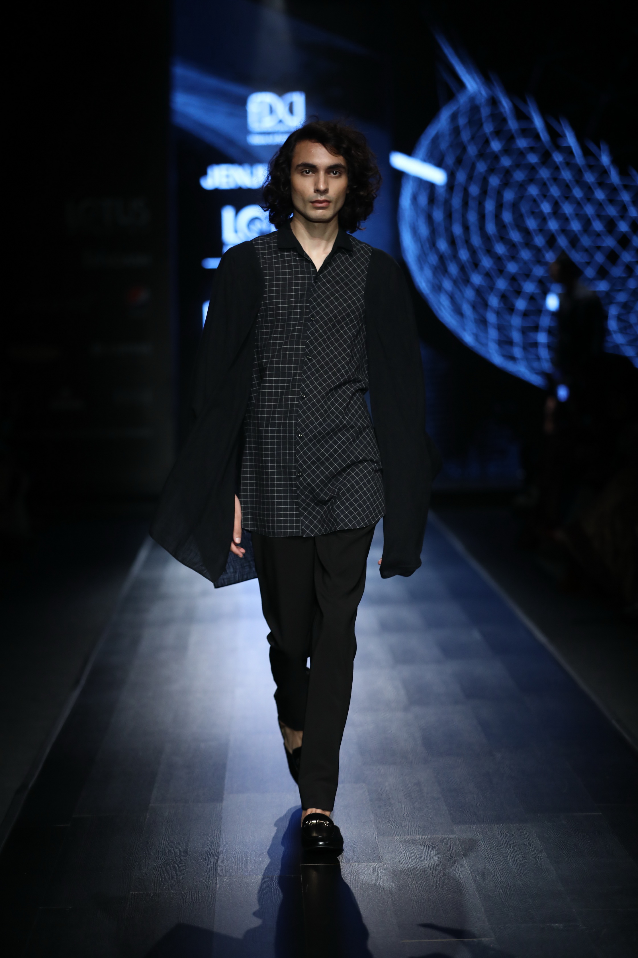 A model showcases the collection from fashion designer Jenjum Gadi's fashion label 'Abstract' on the second day of Lotus Make-up India Fashion Week, in New Delhi on Oct 10, 2019. (Photo: IANS)