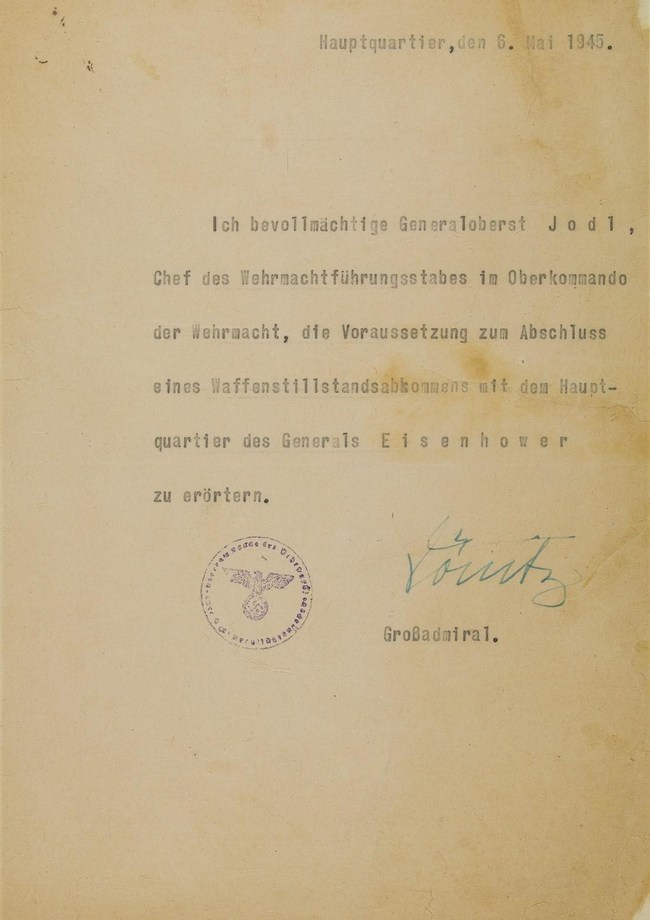 Letter given to Field Marshal Alfred Jodl. His official credentials allowing him to negotiate Germany's surrender in World War II with the Allies. Signed by Karl Donitz, president of Germany, Source