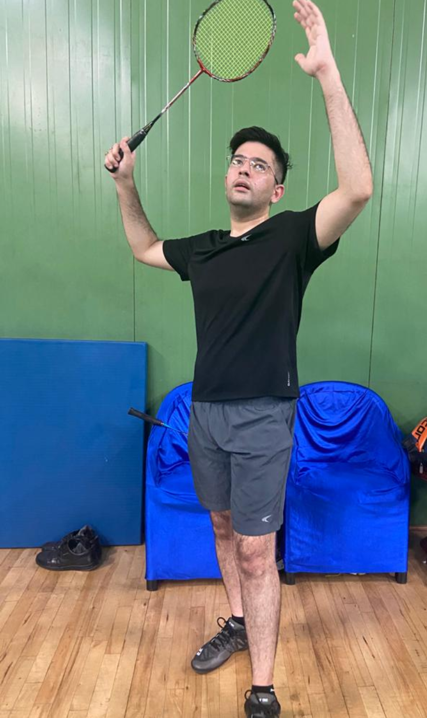 Raghav Chadha playing badminton, Source: IANS