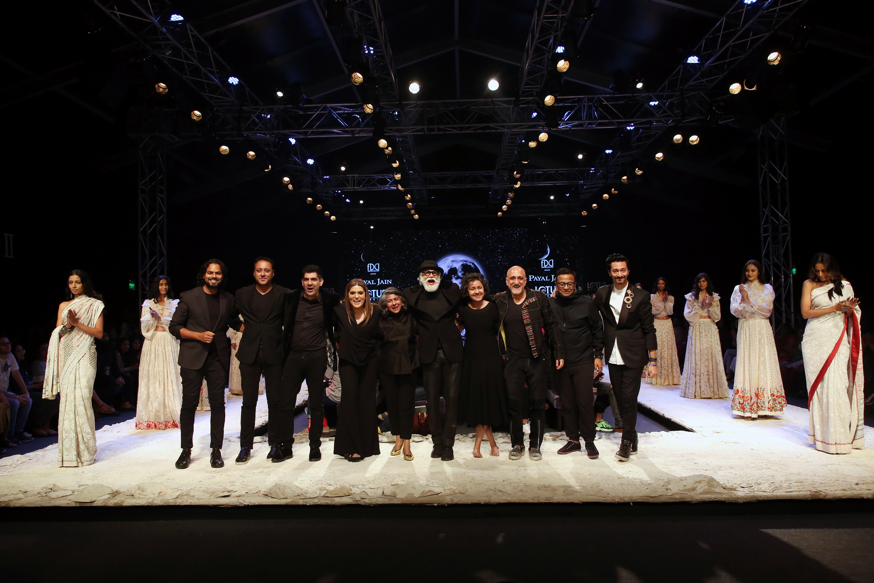 Showstopper (L-R) Rahul Mishra, Varun Bahl, Safir Anand, Reynu Taandon, Anjana Bhargav, FDCI president Sunil Sethi, Payal Jain, Mano Viraj Khosla, Geisha Bairoliya, Nitin Bal Chauhan