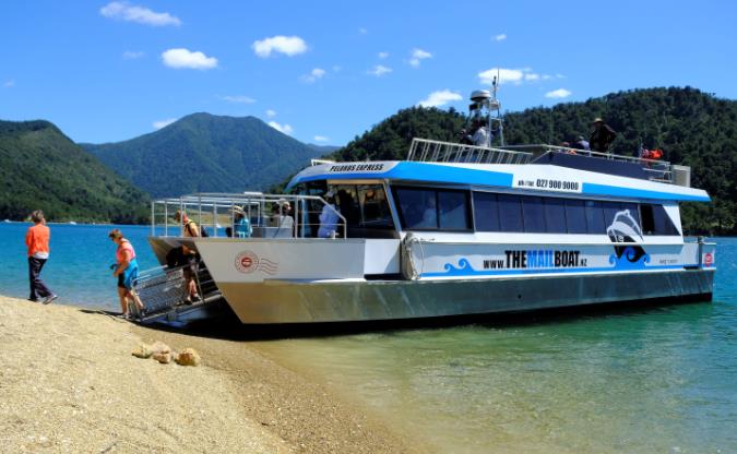 The Pelorus Mail Boat making a drop at Duncan Bay