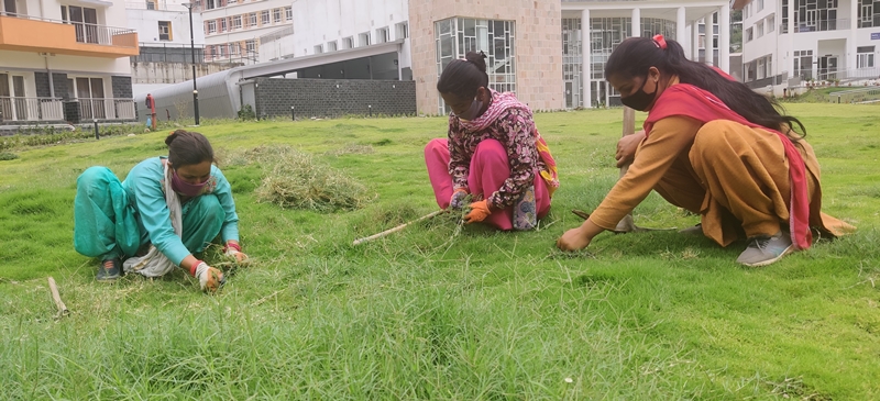 Women empowered by EWOK Society working with necessary precautions during Covid times at IIT Mandi.