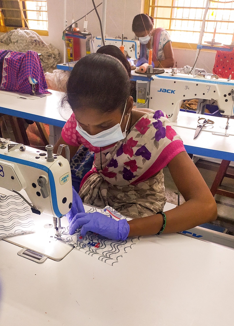 Women in Charoti making masks