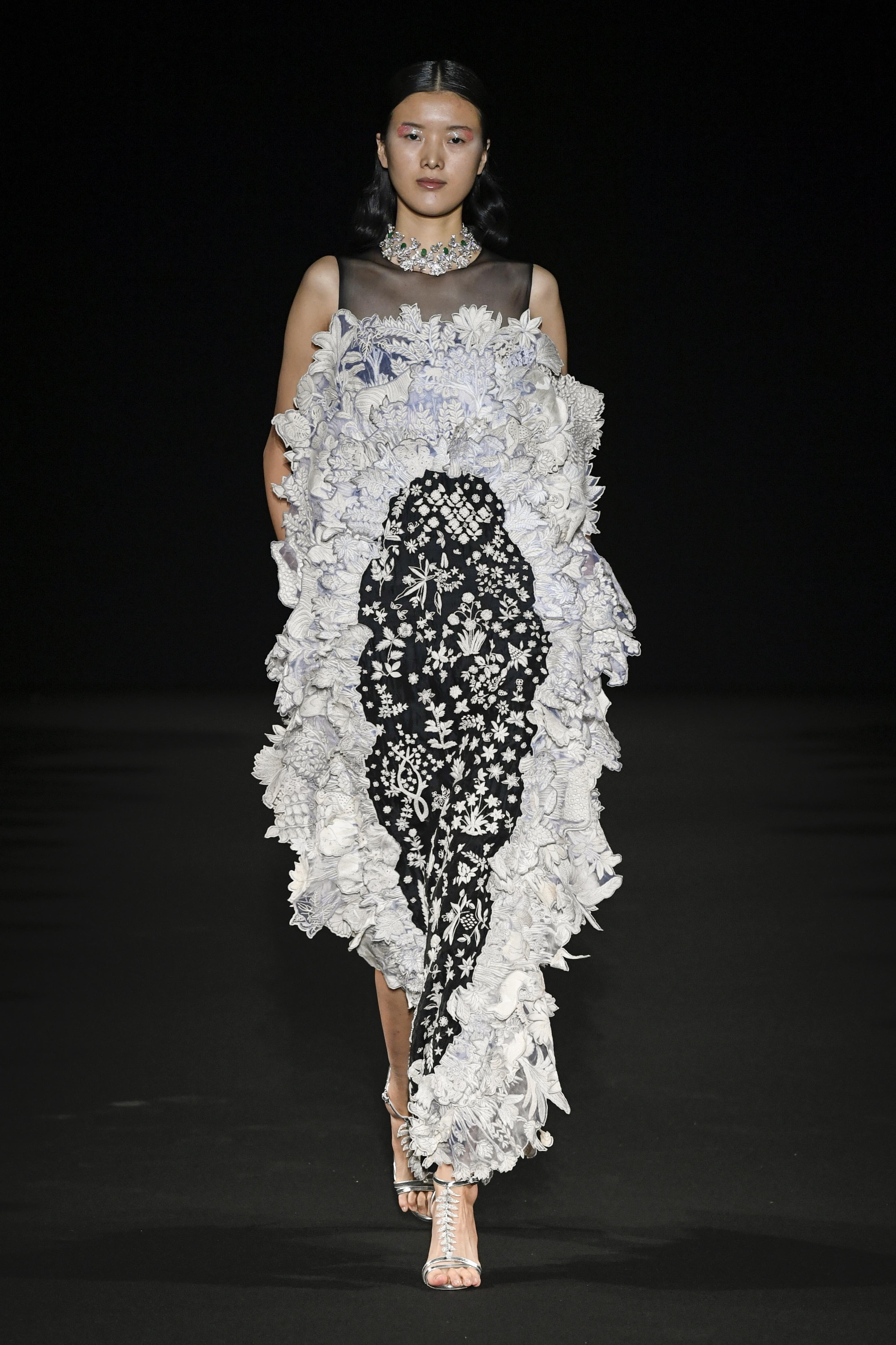 A model showcases fashion designer Rahul Mishra's creation.