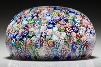 A Baccarat dated close millefiori weight