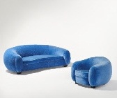 JEAN ROYÈRE (1902-1981) 'OURS POLAIRE' SOFA AND ARMCHAIR, CIRCA 1950  painted beech, velvet upholstery sofa: 31½ x 89 x 50 in. armchair: 29 x 38½ x 37 in.  $800,000-1,200,000