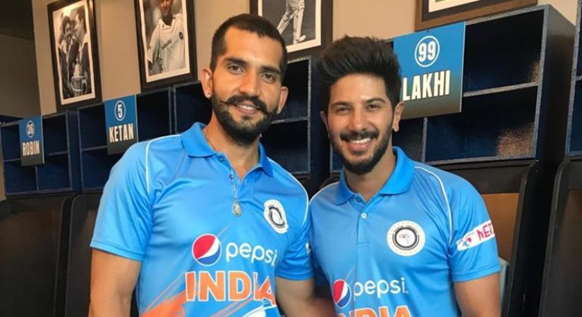 Actors Abhilash Chaudhary and Dulquer Salmaan.