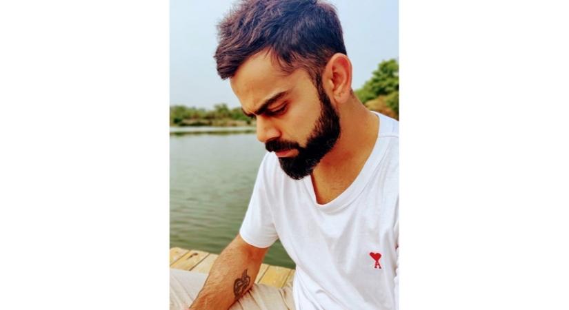 Indian cricket captain Virat Kohli showcased his love for his wife Anushka Sharma by flaunting a t-shirt with the actress's initials.