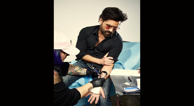 Actor John Stamos upped the stakes in his prank battle with Nick Jonas, as he posted a photograph of himself seemingly getting a tattoo of the singer's face. (Photo: Twitter/@JohnStamos)