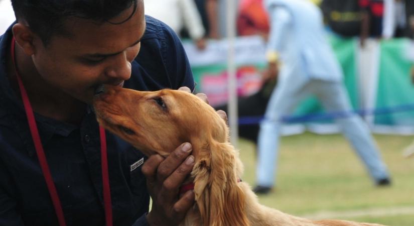 Kolkata: A man with his pet at a dog show organised by Calcutta Canine Club in Kolkata, on Dec 15, 2018. (Photo: IANS)