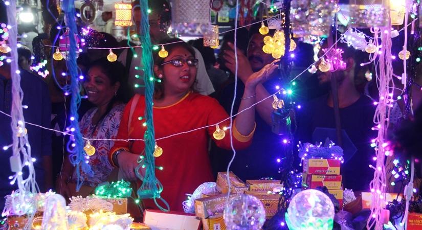 People busy buying electric fancy lights ahead of Diwali - festival of light in Kolkata on Oct 20, 2019. (Photo: Kuntal Chakrabarty/IANS)