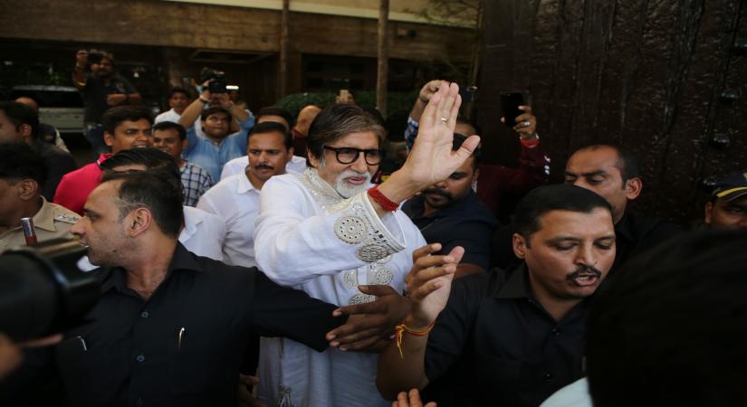 Mumbai: Actor Amitabh Bachchan greets fans who gathered outside his residence "Prateeksha" to wish him on his 77th birthday, in Mumbai on Oct 11, 2019. (Photo: IANS)