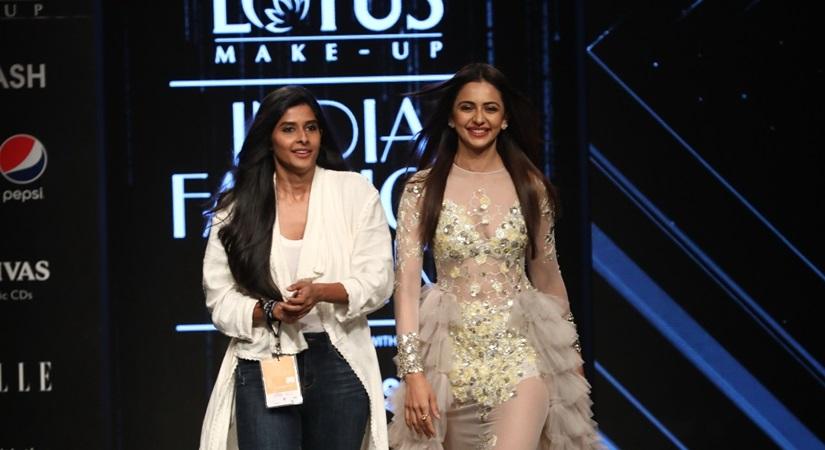 Actress Rakul Preet Singh and fashion designer Divya Reddy on the third day of Lotus Make-up India Fashion Week, in New Delhi on Oct 11, 2019. (Photo: IANS)