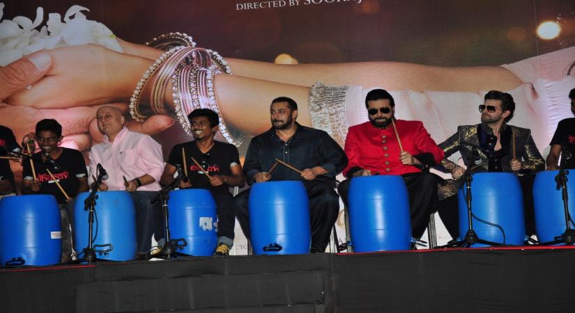 Mumbai: Actors Anupam Kher, Salman Khan, Arman Kohli and Neil Nitin Mukesh celebrate Diwali with Dharavi Rocks, a band of kids who make music out of waste materials in Mumbai on Nov 11, 2015. (Photo: IANS)