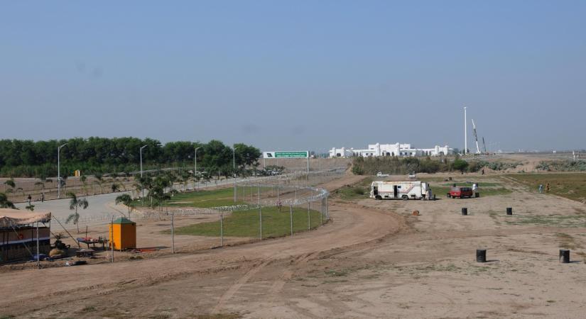 Dera Baba Nanak: Construction work in progress at the Pakistani side of the International border for the Kartarpur Corridor, as seen from Zero Point near Dera Baba Nanak in Gurdaspur district of Punjab, India on Oct. 24, 2019