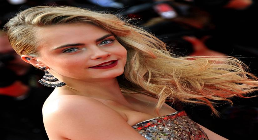 CANNES, May 21, 2014 (Xinhua) -- Cara Delevingne arrives at the red carpet for the screening of the film "The Search" at the 67th Cannes Film Festival in Cannes, southern France, on May 21, 2014. (Photo: Xinhua/Chen Xiaowei/IANS)