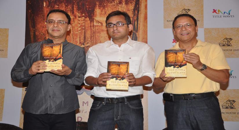 Filmmaker Vidhu Vinod Chopra with author Rahul Pandita at the launch of Rahul Pandita`s book `Our Moon has Blood Clots` in Bandra, Mumbai on Monday, February 4th, evening. (Photo: IANS)