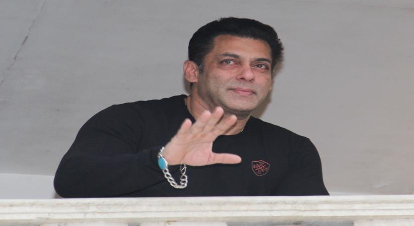 Mumbai: Actor Salman Khan comes out in his balcony to greet fans who had gathered outside the Galaxy Apartments to wish him on his 54th birthday, in Mumbai on Dec 27, 2019. (Photo: IANS)