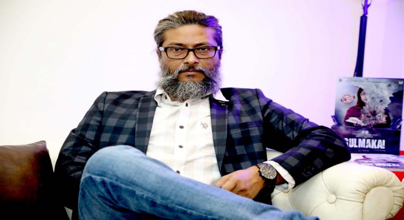 Director H.E. Amjad Khan.