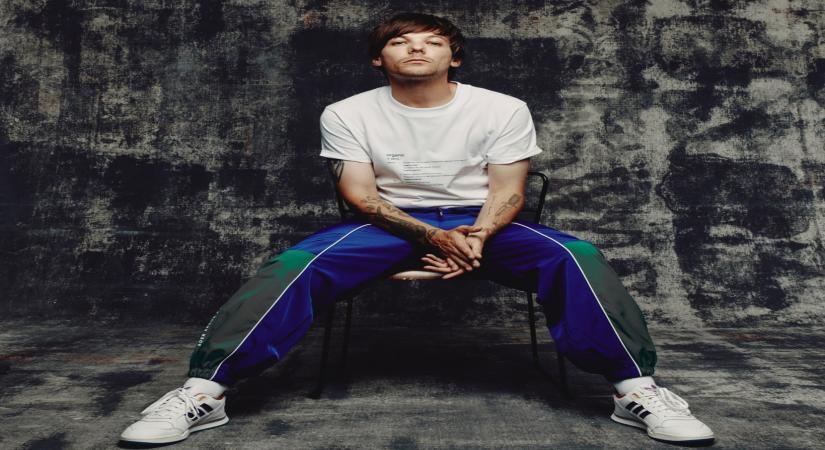 Singer Louis Tomlinson has returned with a new song, "Walls", which reflects on parting ways with a lover. He says he pretends not to be romantic, but he is.