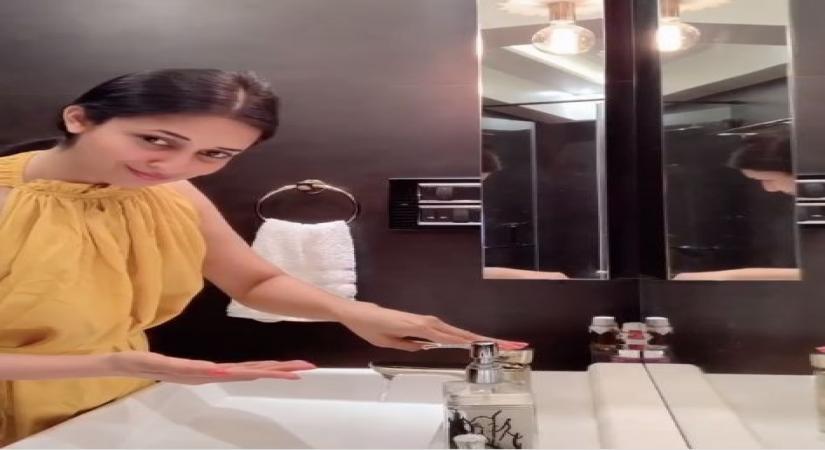 Divyanka Tripathi performs the safe hand challenge.