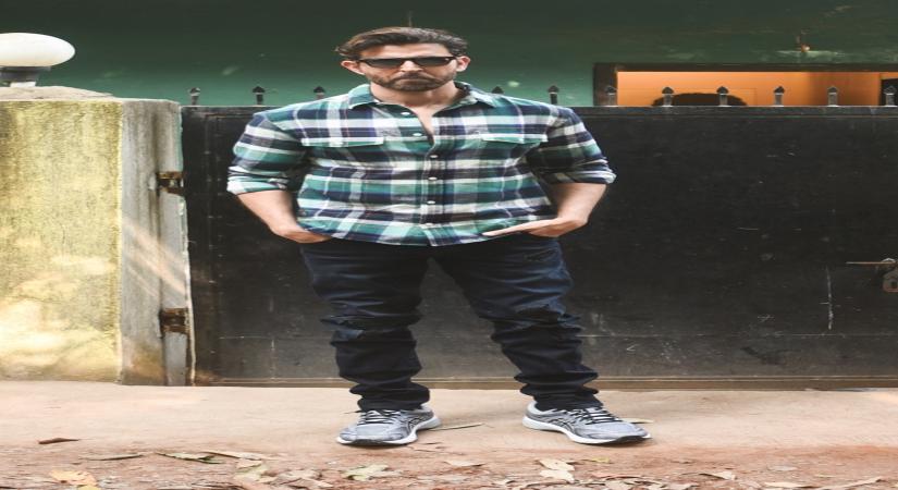 Mumbai, April 1 (IANS) Amid lockdown, Bollywood actor Hrithik Roshan has been trying to hone his piano skills even as his former wife Sussanne Khan photobombs him.
