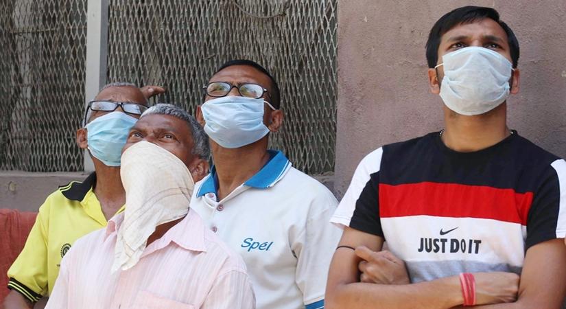  Fire and police personnel arrive wearing masks at a high-rise building, the 16th floor of which caught fire amid lockdown in the wake of COVID-19 pandemic, in Kolkata. (Photo: Kuntal Chakrabarty/IANS)