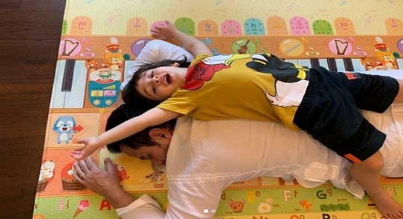 Kareena floored by Saif and son's back-to-back photo-op.