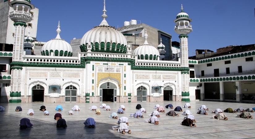 People offer Eid prayers at a mosque following social distancing norms in Amritsar on the occasion of Eid-Ul-Fitr during the fourth phase of the nationwide lockdown imposed to mitigate the spread of coronavirus, on May 25, 2020. (Photo: IANS)