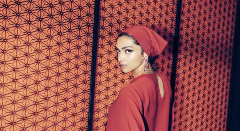 Keeping it red head-to-toe at a recent event, the actress picked a dress from Valentino and Kamyen earrings.