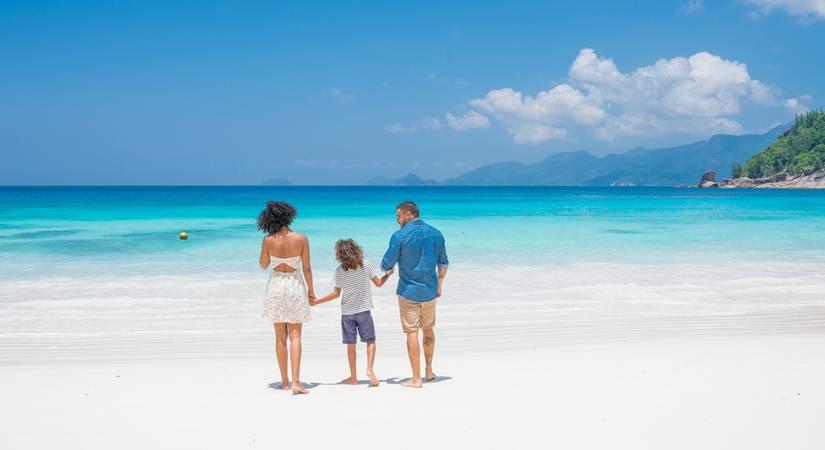 Family on Petite Anse Beach, Mahe - image courtesy Michel Denousse