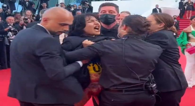 Woman protesting Ukraine sexual violence removed from Cannes Red Carpet.(photo:Twitter/THE PERSON)