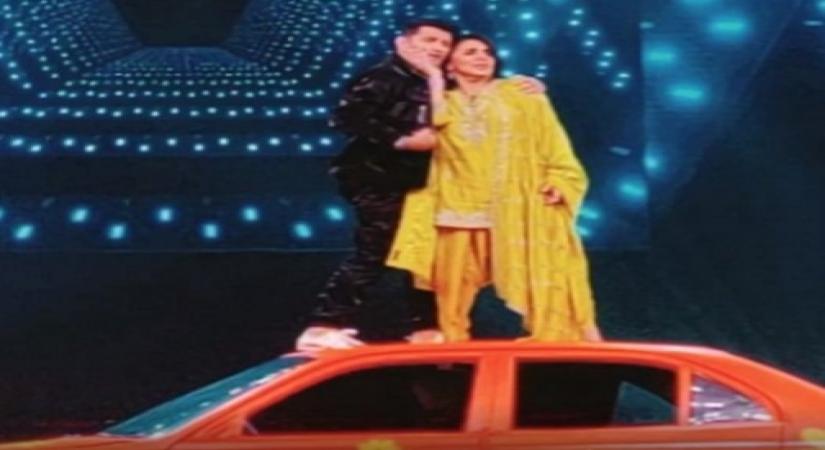 Neetu Kapoor grooves on 'O haseena zulfon waali' as she stands on roof of car.(photo:INSTAGRAM)