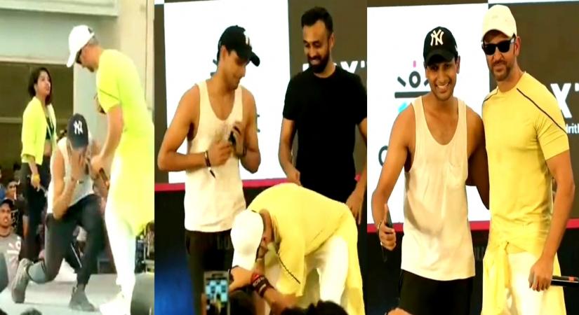 Hrithik touches fan's feet, netizens call him 'most humble superstar'.(photo:Twitter)