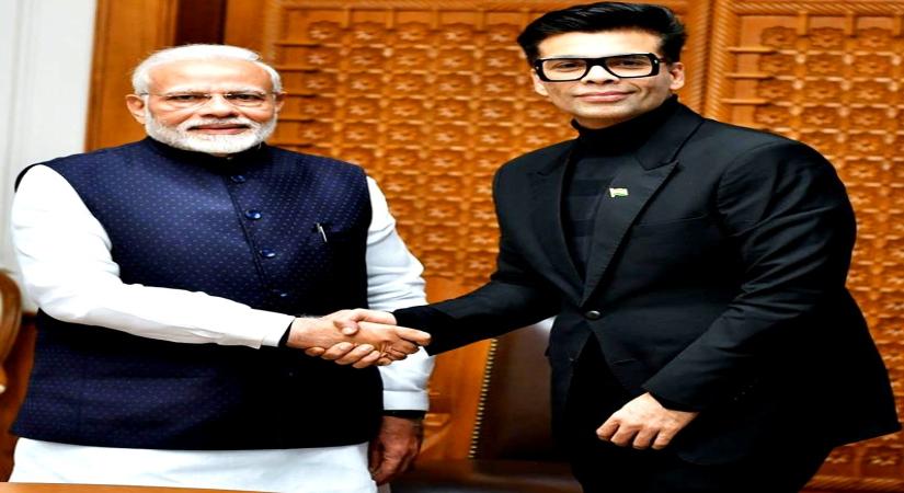 Prime Minister Narendra Modi and Bollywood filmmaker Karan Johar. (Image: Twitter).