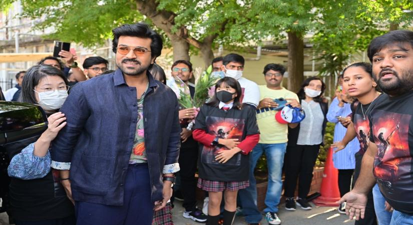 RRR' star Ram Charan hits it off with school kids in Japan