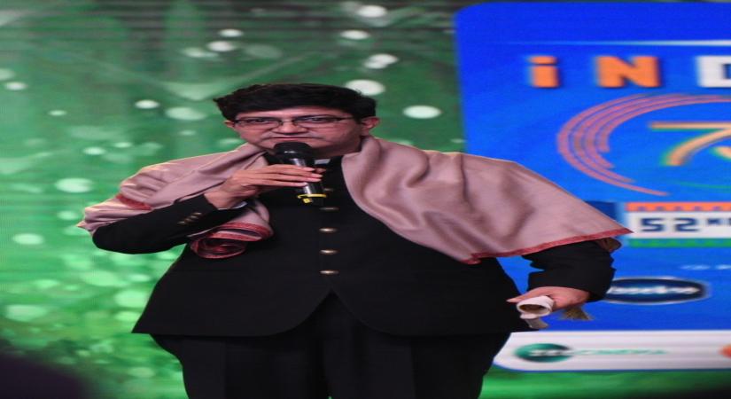Panaji : Indian Film Personality of the year awarded to Prasoon Joshi by Anurag Thakur during the 52nd IFFI Closing Ceremony at Shyama Prasad Mukherjee Indoor Stadium in Goa on Sunday 28 November 2021. (Photo: Atish Naik/IANS)
