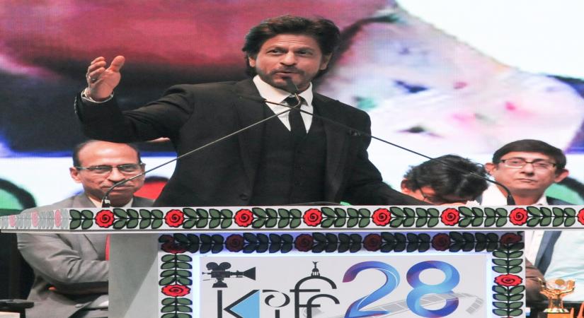 Kolkata: Actor Shah Rukh Khan addressing during the inauguration of 28th Kolkata International Film Festival at Netaji Indoor Stadium in Kolkata on Thursday, December 15, 2022. (Photo:Kuntal Chakrabarty/IANS)