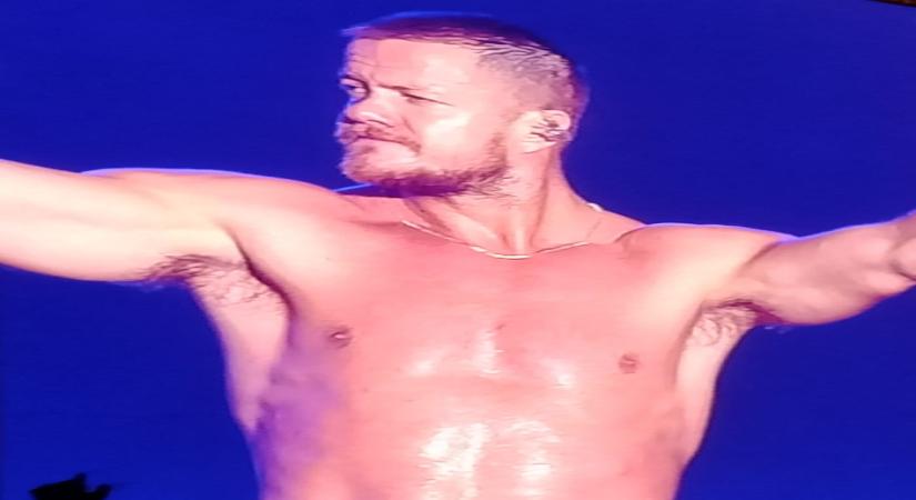 Dragons frontman Dan Reynolds goes shirtless at Lollapalooza.