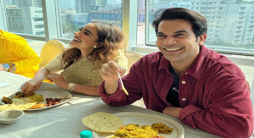 Rajkummar Rao having prasad in Saraswati Puja