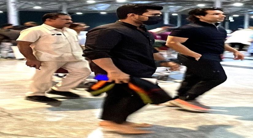 Barefoot, clad in black actor Ram Charan is piety personified as he takes off for US in run up to Oscars