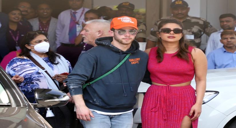 Mumbai : Actress Priyanka Chopra with husband Nick Jonas and daughter Malti Marie Chopra Jonas at Mumbai airport on Friday, March 31, 2023. (Photo:Sanjay Tiwari/IANS)